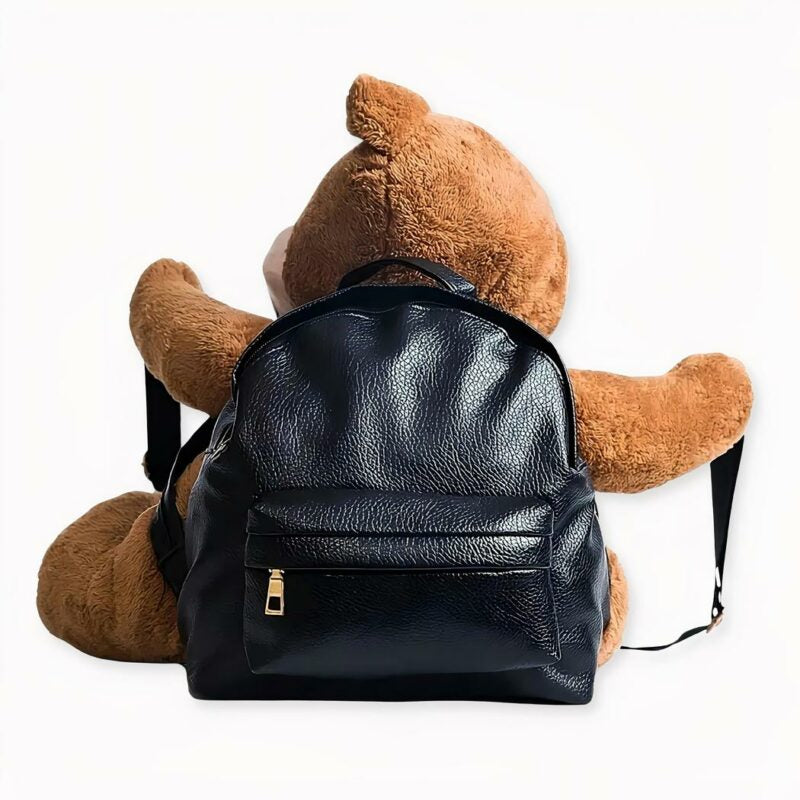 sac à dos noir et nounours