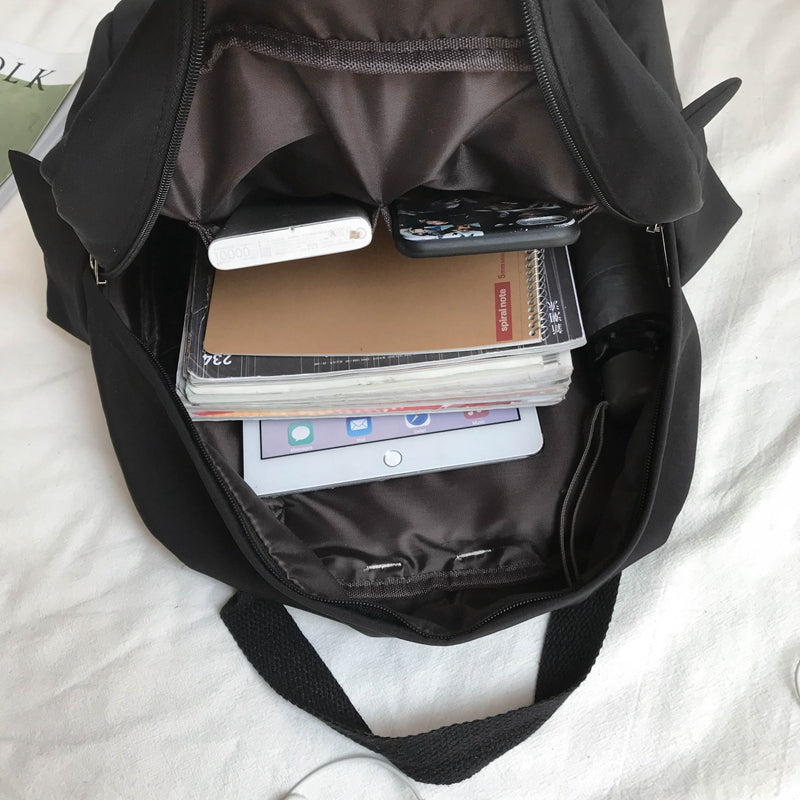 Rangement pratique pour les affaires scolaires avec le Sac à Dos Noir Collège Garçons